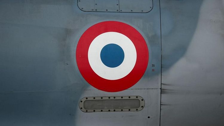French pilot says he was tied to firing target in hazing ritual