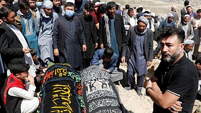 Afghan school blast toll rises to 58, families bury victims Afghan school blast toll rises to 58, families bury victims