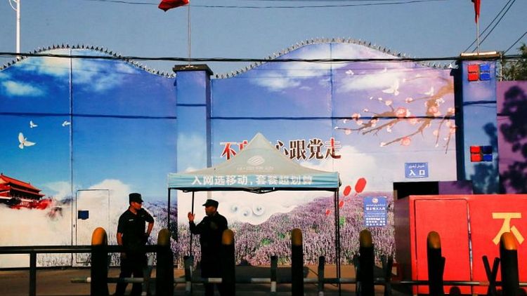 U.N. rights chief seeks Xinjiang visit this year, says HK trials key test