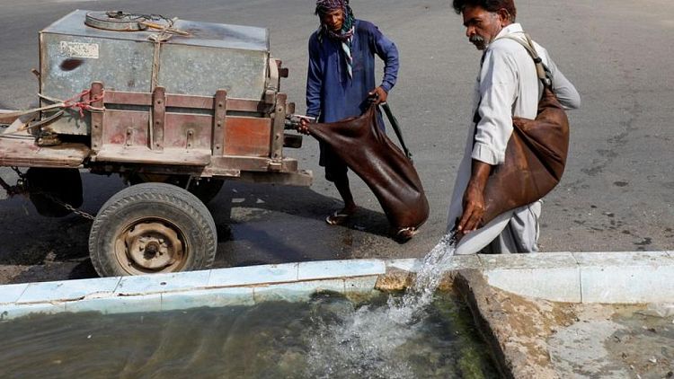 Pakistan's water bearers quench thirst in Ramadan, but fear for their trade