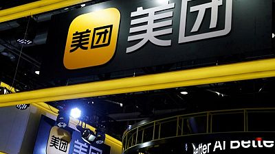 Meituan shares slump as fallout from CEO's poem post festers