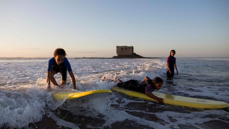In Moroccan backwater, surfers give kids a taste of waves and freedom