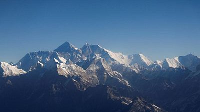 Exhaustion kills two Everest climbers, an American and a Swiss Exhaustion kills two Everest climbers, an American and a Swiss