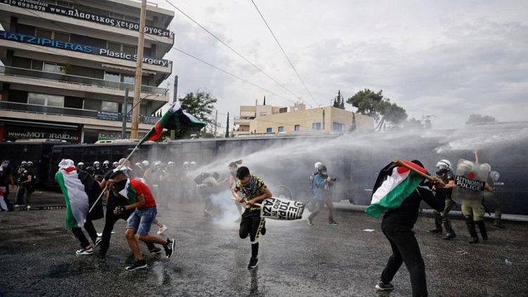 Police fire water cannon at pro-Palestinian demonstrators in Athens