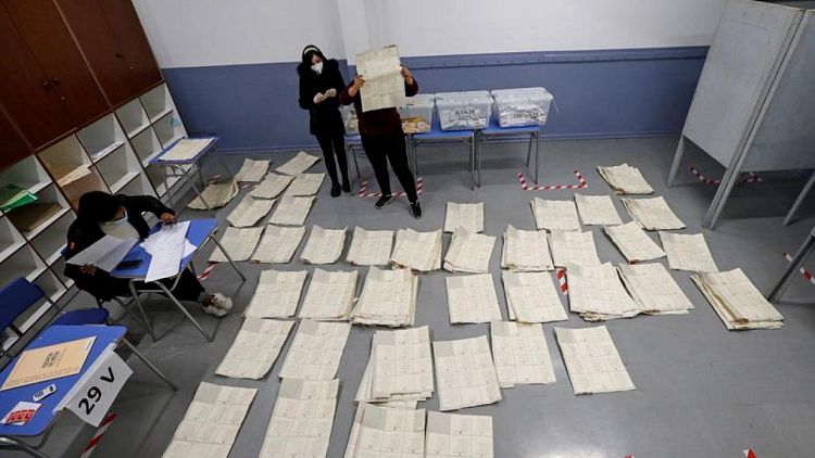 Chile's govt in shock loss as voters pick independents to draft constitution