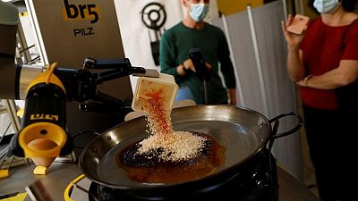 Ole! Spanish chef gives thumbs up to a robot-made paella