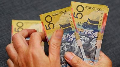 Aussie, rand flounder as Omicron spooks investors Aussie, rand flounder as Omicron spooks investors