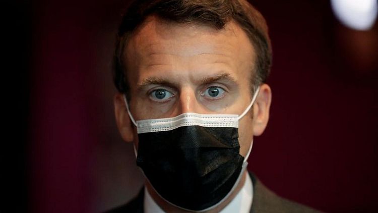 Macron calls for WHO powers to be boosted, Merkel backs call for pandemic treaty
