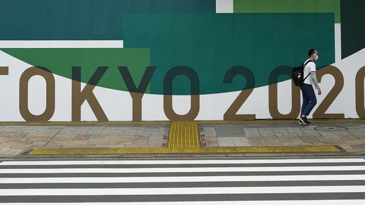 El CEO de SoftBank critica los JJOO mientras Japón acelera la vacunación