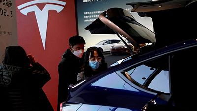 Tesla opens first charging station in China with energy storage facilities