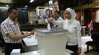 Syrians go to the polls in election that Assad is set to win