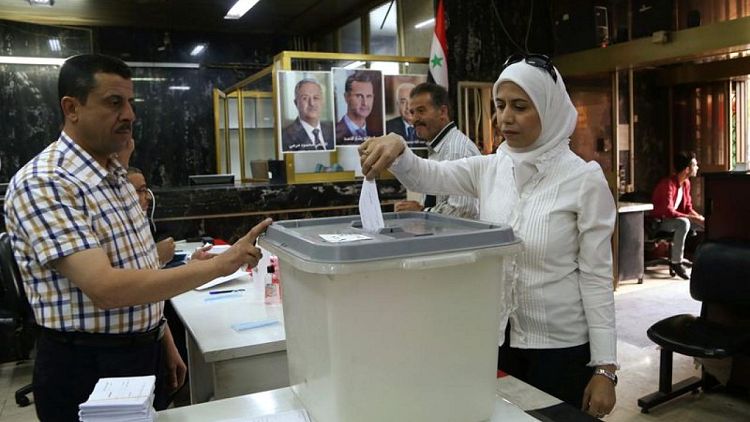 Los sirios acuden a las urnas en unas elecciones que ganará Assad