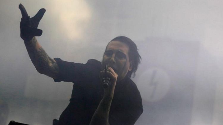Arrest warrant issued for singer Marilyn Manson on assault charges in New Hampshire