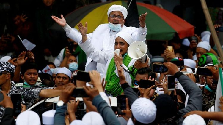 Indonesian court set to deliver verdict on hardline cleric accused of flouting COVID curbs