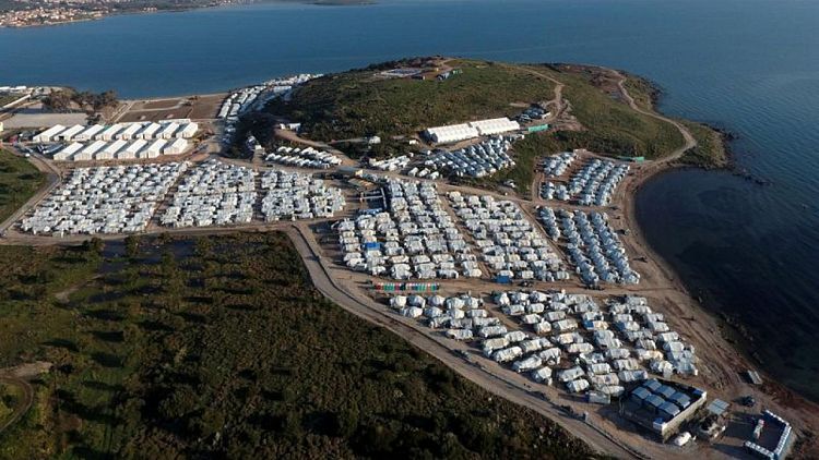 Greece seeks bids to build closed holding centres for migrants on islands