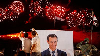 Syria's Assad tells voters they have re-defined revolution Syria's Assad tells voters they have re-defined revolution