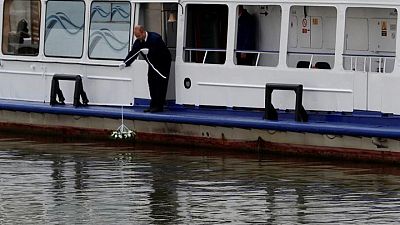 With bells and flowers, Hungary marks anniversary of Danube boat disaster With bells and flowers, Hungary marks anniversary of Danube boat disaster