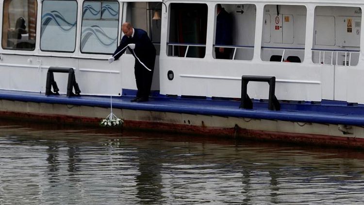 With bells and flowers, Hungary marks anniversary of Danube boat disaster