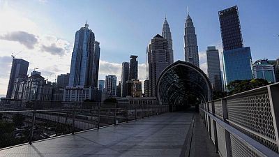 Empty streets and malls as Malaysia locks down