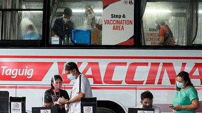 Philippines to open COVID-19 vaccinations to include more workers