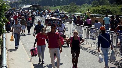 Colombia reopens border with Venezuela after 14 months Colombia reopens border with Venezuela after 14 months
