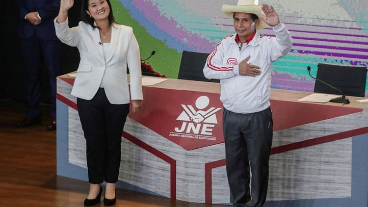 Peru's Castillo falls in polls, suggesting photo finish against Fujimori