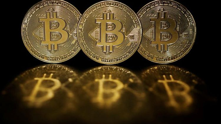 Bitcoin rises 9.8 percent to $39,035