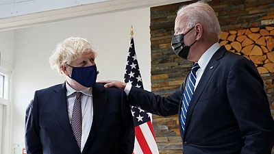 With a nod to Black Lives Matter, UK's Johnson gives Biden mural photo