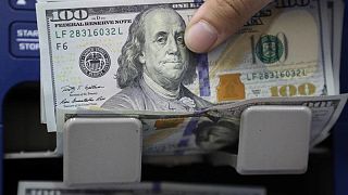 Dollar little changed as traders seek direction from Fed meeting