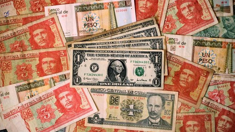 Cuba suspending cash bank deposits in dollars, citing U.S. sanctions