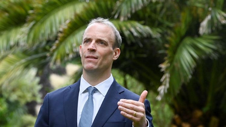 Britain wants to ease tensions with EU over N.Ireland, says Raab