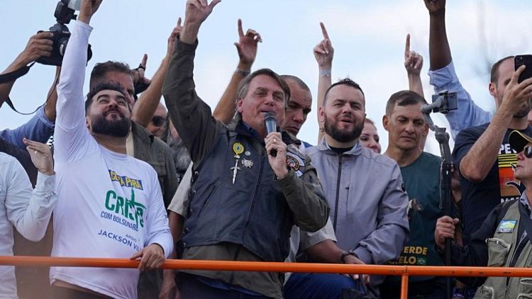 After biker rally, Brazil's Bolsonaro says cops will support him 'whatever happens'