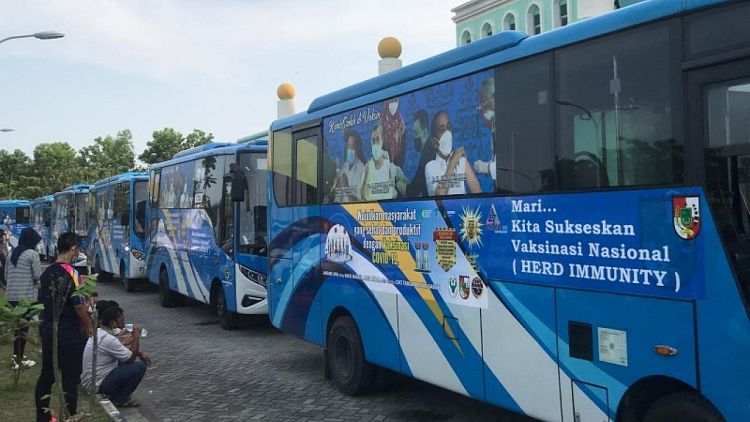COVID-19 shots to the people: Indonesia city revs up vaccine buses