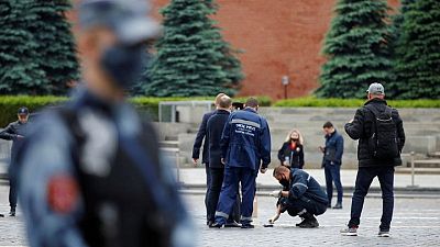 Russian held in jail over faked suicide 'protest performance' on Red Square Russian held in jail over faked suicide 'protest performance' on Red Square