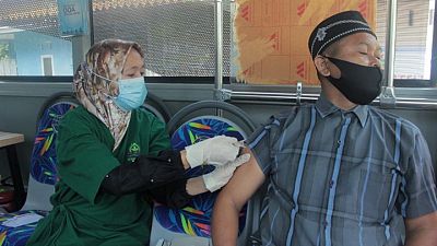 Indonesia warns COVID-19 cases may not peak until July as hospitals fill Indonesia warns COVID-19 cases may not peak until July as hospitals fill