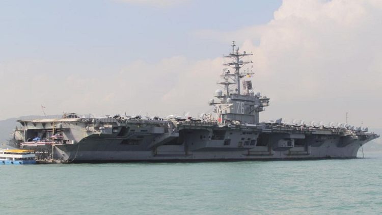 U.S. Navy says carrier group operating in S.China Sea