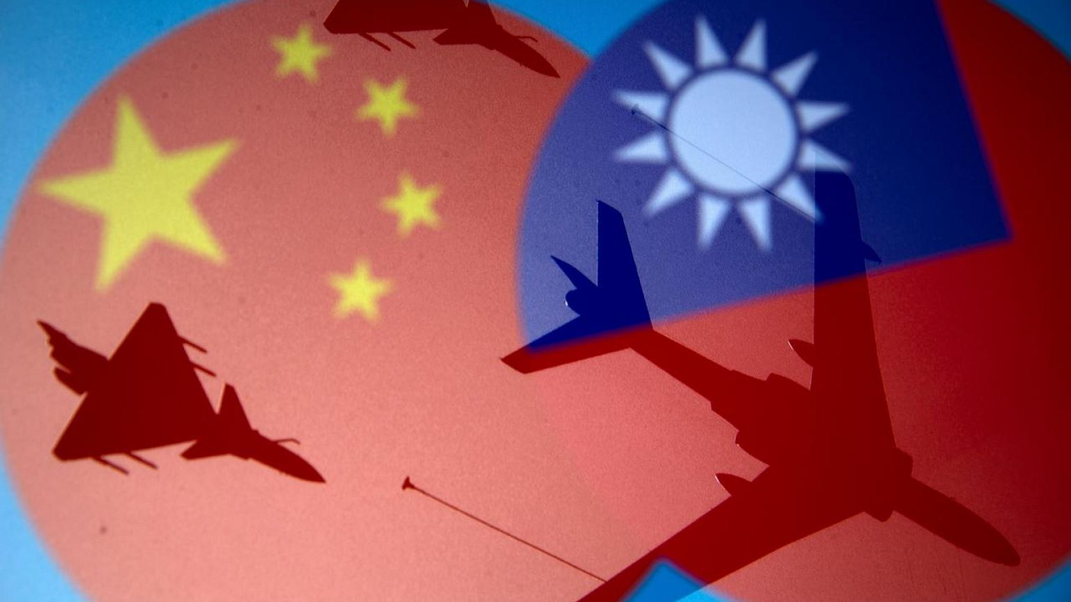 After massed plane incursion near Taiwan, China says must respond to 'collusion'