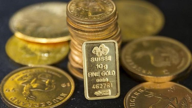 METALES PRECIOSOS-Precios del oro se mantienen estables antes de comunicado Fed