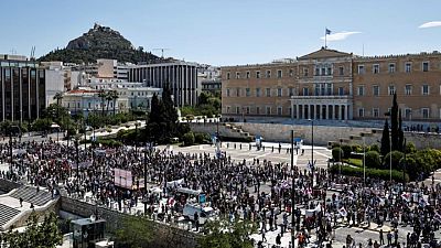 Greek lawmakers pass labour reform amid protests, strike Greek lawmakers pass labour reform amid protests, strike