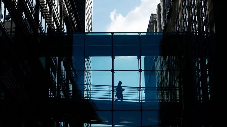 JPMorgan, Goldman Sachs delay workers' return to U.K. offices