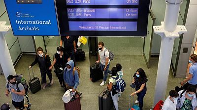 Britain considers vaccine passports to restart international travel Britain considers vaccine passports to restart international travel