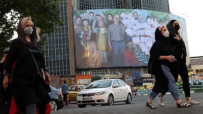 Iran urges voters to take part in Friday's presidential election Iran urges voters to take part in Friday's presidential election