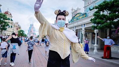 Disneyland Paris reopens, but Mickey Mouse won't give hugs Disneyland Paris reopens, but Mickey Mouse won't give hugs