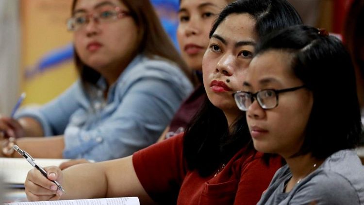 Philippines raises cap on health professionals going abroad