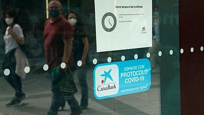 Caixabank to reduce planned job cuts by 1,300 following strike