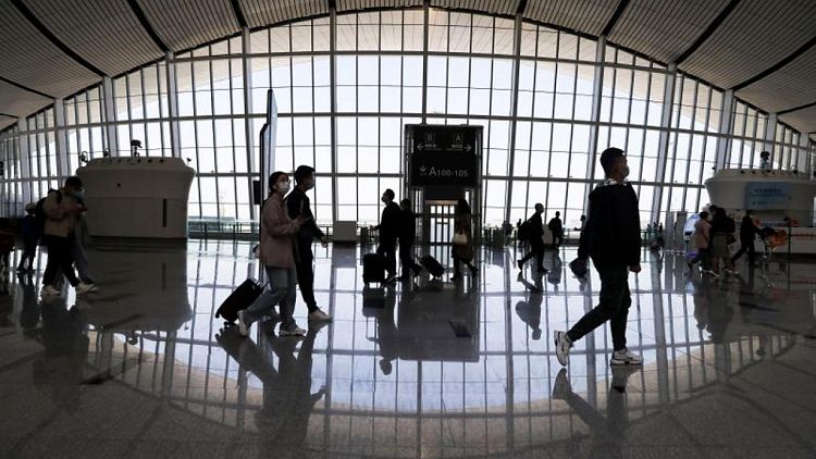 China's COVID-hit Shenzhen suspends direct flights to Beijing