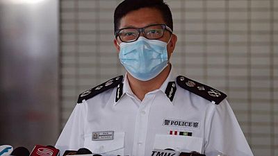 Hong Kong security chief steps up pressure on city's main press group