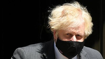 UK PM Johnson stands by Hancock after kissing picture UK PM Johnson stands by Hancock after kissing picture