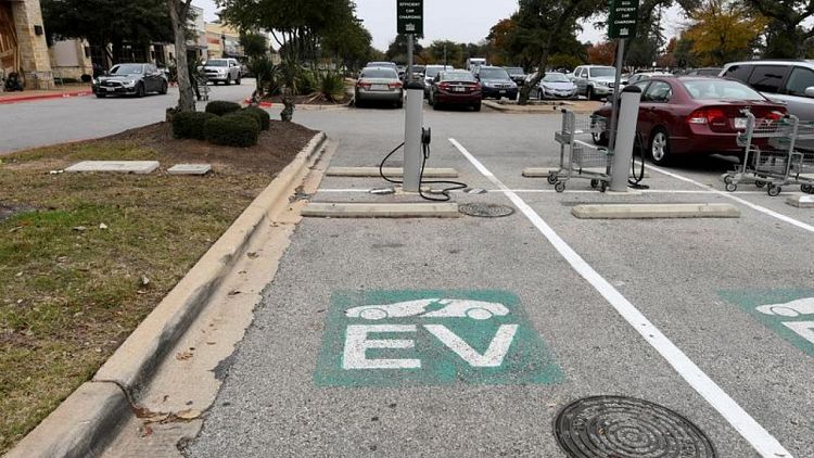 Biden's EV charging push boosts established automakers taking on Tesla