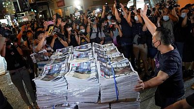 Hong Kong police arrest former Apple Daily journalist at airport - media Hong Kong police arrest former Apple Daily journalist at airport - media